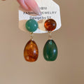 Chinese Style Resin Waterdrop Asymmetric Pendant Drop Earrings With Silver Pin Stud Design view 4