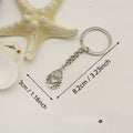 Metal Hollow Heart Drop Shape Keychain Bag Charm view 2
