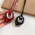 Light Luxury Leather Waterdrop Pendant Sweater Necklace For Women With Alloy Geometric Round Charm view 1