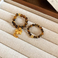 Light Luxury Tiger Eye Copper Coin Pony Stretch Ring For Women New Chinese Retro Geometric Design view 2