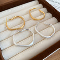 Matte Gold Plated Irregular Metal Hoop Earrings With Silver Pins Minimalist Geometric Style view 2