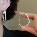 Matte Gold Plated Irregular Metal Hoop Earrings With Silver Pins Minimalist Geometric Style view 3