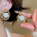 Light Luxury Alloy Irregular Rhombus Striped Hollow Enamel Stud Earrings view 4