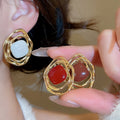 Light Luxury Alloy Irregular Rhombus Striped Hollow Enamel Stud Earrings view 2