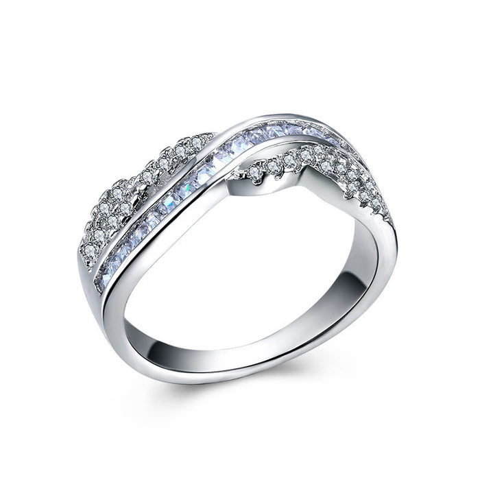 Silver-Tone Wave Ring with Baguette and Pavé Stones