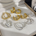 Elegant Korean Brushed Gold Alloy Hoop Earrings With Black Polka Dot Accents, Minimalist Statement Earrings view 2
