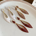 Light Luxury Hollow Teardrop Alloy Drop Earrings With Enamel Drip Design And Silver Tone Posts view 4