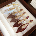 Light Luxury Hollow Teardrop Alloy Drop Earrings With Enamel Drip Design And Silver Tone Posts view 2