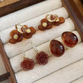Coffee Brown Resin Flower Drop Earrings With Rhinestone Accents And Silver Posts view 1