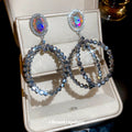 Light Luxury Crystal Hollow Oval Pendant Drop Earrings With Silver Post Studs view 1