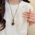 Old Money Style Tiger Eye Heart Pendant Sweater Necklace With Ceramic Geometric Round Charm view 2