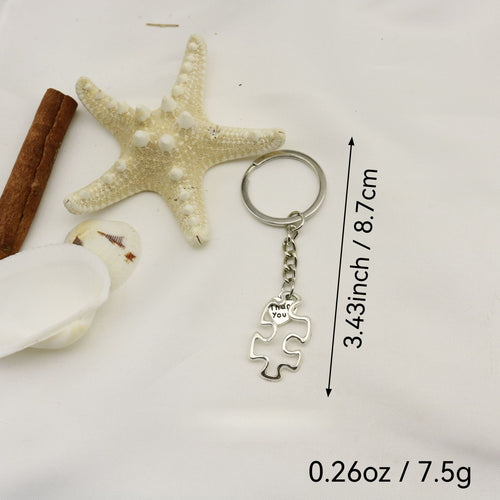 Zinc Alloy Hollow Puzzle Heart Keychain Bag Charm Gift