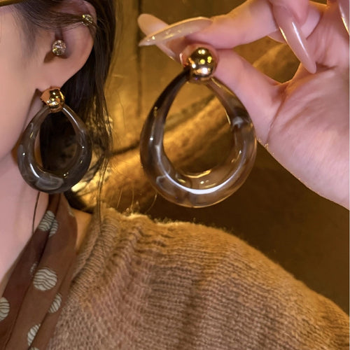 Light Luxury Resin Teardrop Hollow Pendant Drop Earrings With Silver Needle Studs For Women