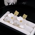 Elegant Vacation Style Acrylic Flower Drop Studs With Hammered Gold Alloy Square Tops Earrings view 3