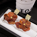 Elegant Vacation Style Acrylic Flower Drop Studs With Hammered Gold Alloy Square Tops Earrings view 4