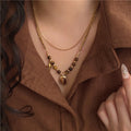 Stainless Steel Tiger Eye Oval Pendant Necklace Maillard Style Geometric Clavicle Chain view 3