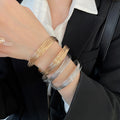 Iron Metal Twisted Wrap Open Bangle For Women European American Light Luxury Statement Jewelry view 3