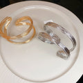 Iron Metal Twisted Wrap Open Bangle For Women European American Light Luxury Statement Jewelry view 2