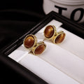 French Vintage Light Luxury Gold Alloy Oval Tiger Eye Acrylic Faux Pearl Double Stud Earrings view 3
