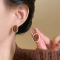 Light Luxury Coffee Flocked Alloy Geometric Heart Stud Earrings For Women view 4