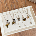 Stainless Steel Tiger Eye Beaded Pendant Sweater Necklace, Light Luxury Geometric Round Design view 2