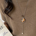 Light Luxury Faux Pearl Sweater Necklace With Wooden Horse Pendant For Daily Commuter Style view 1