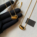 18K Gold Plated Tiger Eye Oval Pea Pendant Necklace, Old Money Light Luxury Collarbone Chain view 2
