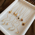 Vintage Light Luxury Copper Tiger Eye Heart Geometric Round Pendant Adjustable Sweater Necklace For Women view 4