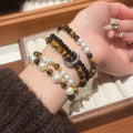 Vintage Tiger Eye Faux Pearl Beaded Bangle For Women Maillard Light Luxury Geometric Bracelet view 1