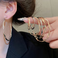 Copper Smooth Twisted Round Hoop Earrings With Silver Posts Minimalist Light Luxury Jewelry view 2