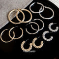 Minimalist Geometric Round Iron Hoop Earrings With Silver Posts And Crinkled Smooth Metal Finish view 1