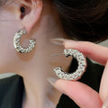 Minimalist Geometric Round Iron Hoop Earrings With Silver Posts And Crinkled Smooth Metal Finish view 4