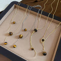 Autumn Winter Retro Light Luxury Tiger Eye Stone Pendant Necklace Copper Geometric Circular Collarbone Chain view 2