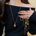 Copper Tiger Eye Round Pendant Sweater Necklace, Retro Maillard Light Luxury Geometric Commuter Chain view 1