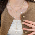 Light Luxury Rhinestone Star Moon Faux Pearl Layered Sweater Necklace Vintage Geometric Collarbone Chain view 3