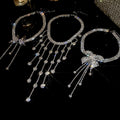 Light Luxury Alloy Butterfly Flower Tassel Necklace With Rhinestone Round Pendant view 3