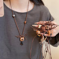 Vintage Light Luxury Wood Bead Bear And Star Pendant Sweater Necklace For Women view 1