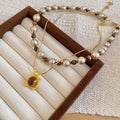 Light Luxury Faux Pearl Sweater Necklace With Tiger Eye Square Pendant Retro Maillard Geometric Collarbone Chain view 4