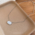 Korean Minimalist Copper Resin Oval Pendant Sweater Necklace, Style Light Luxury Clavicle Chain view 4