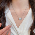 Korean Minimalist Copper Resin Oval Pendant Sweater Necklace, Style Light Luxury Clavicle Chain view 3