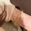 18K Gold Plated Copper Zircon Starburst Bangle French Vintage Light Luxury Geometric Jewelry view 4