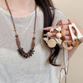 Bohemian Ethnic Geometric Wood Bead Rattan Woven Round Pendant Sweater Necklace For Women view 1