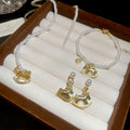 Light Luxury New Chinese Style Copper Horse Coin Pearl Necklace Earrings Bracelet Jewelry Set view 1