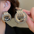 Metal Twisted Hollow Round Stud Earrings With Silver Posts, European American Light Luxury Geometric Jewelry view 3