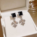 Elegant Crystal Bow Pearl Stud Earrings For Women Luxury Rhinestone Alloy Niche Design Versatile Earrings view 2