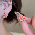 Light Luxury Copper Zircon Apple Maple Leaf Stud Earrings With Enamel Drip Geometric Design view 4