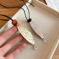 Minimalist Light Luxury Alloy Leaf Pendant Leather Sweater Necklace For Women view 4