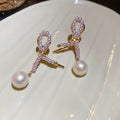 Light Luxury Twisted Faux Pearl Cross Stud Earrings, Vintage Geometric Round Ear Jewelry view 3