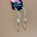Alloy Rhinestone Bamboo Segment Curved Hoop Earrings For Women Luxury Geometric Statement Style view 2