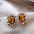 Light Luxury Oval Tiger Eye Stone Pearl Stud Earrings For Women Daily Commute Jewelry view 1